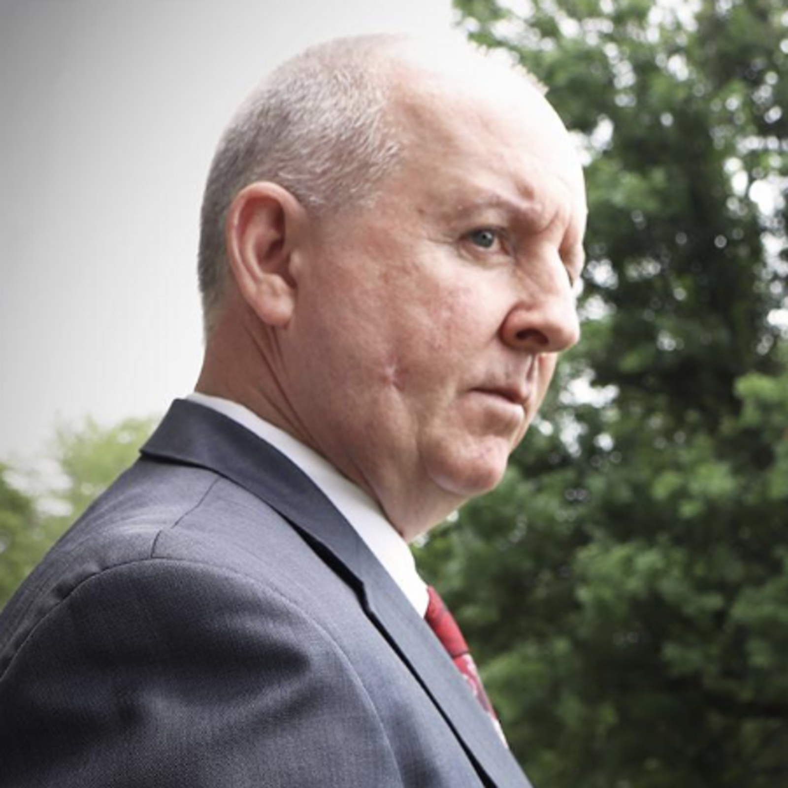 Headshot of Micheál