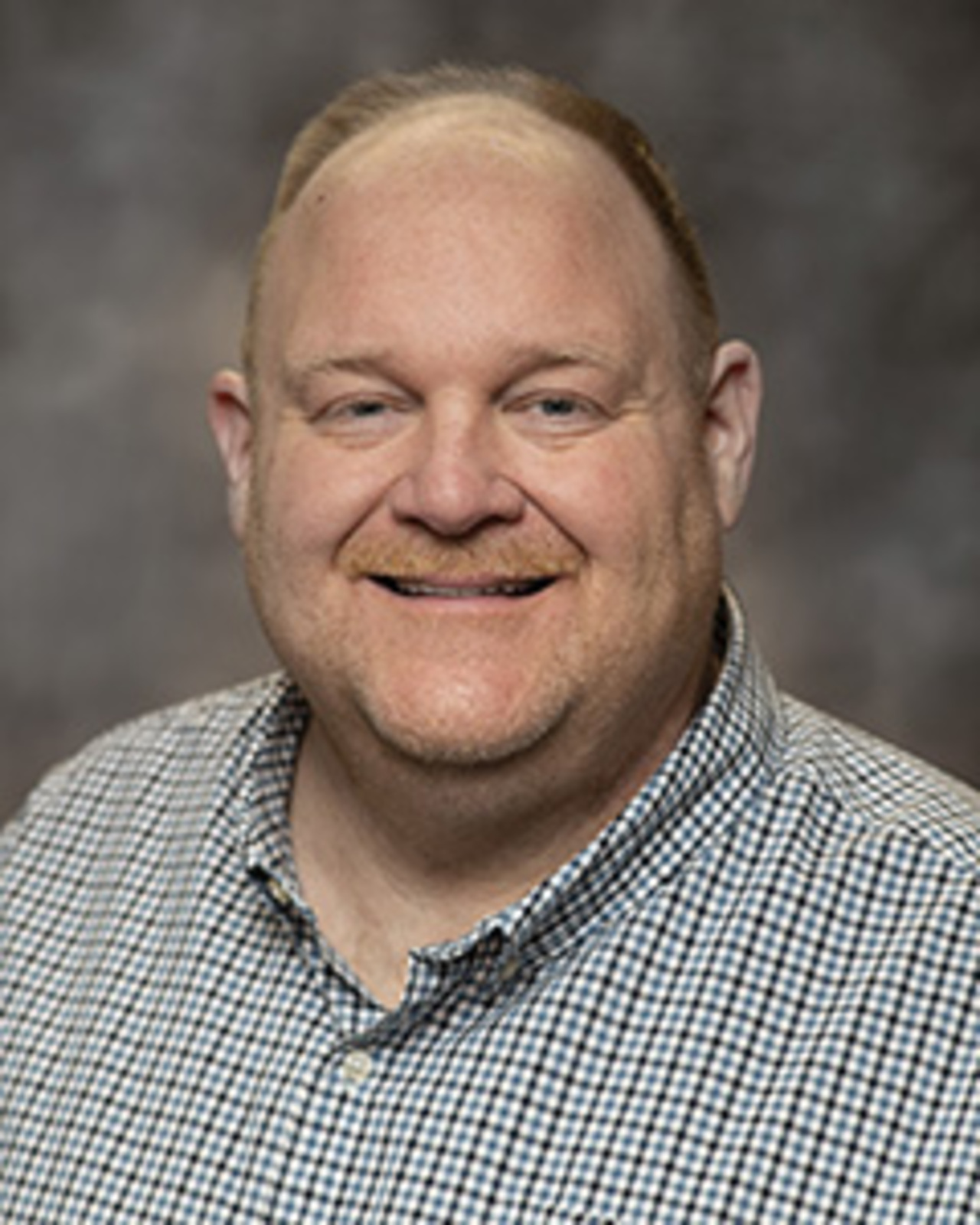 Headshot of Matthew