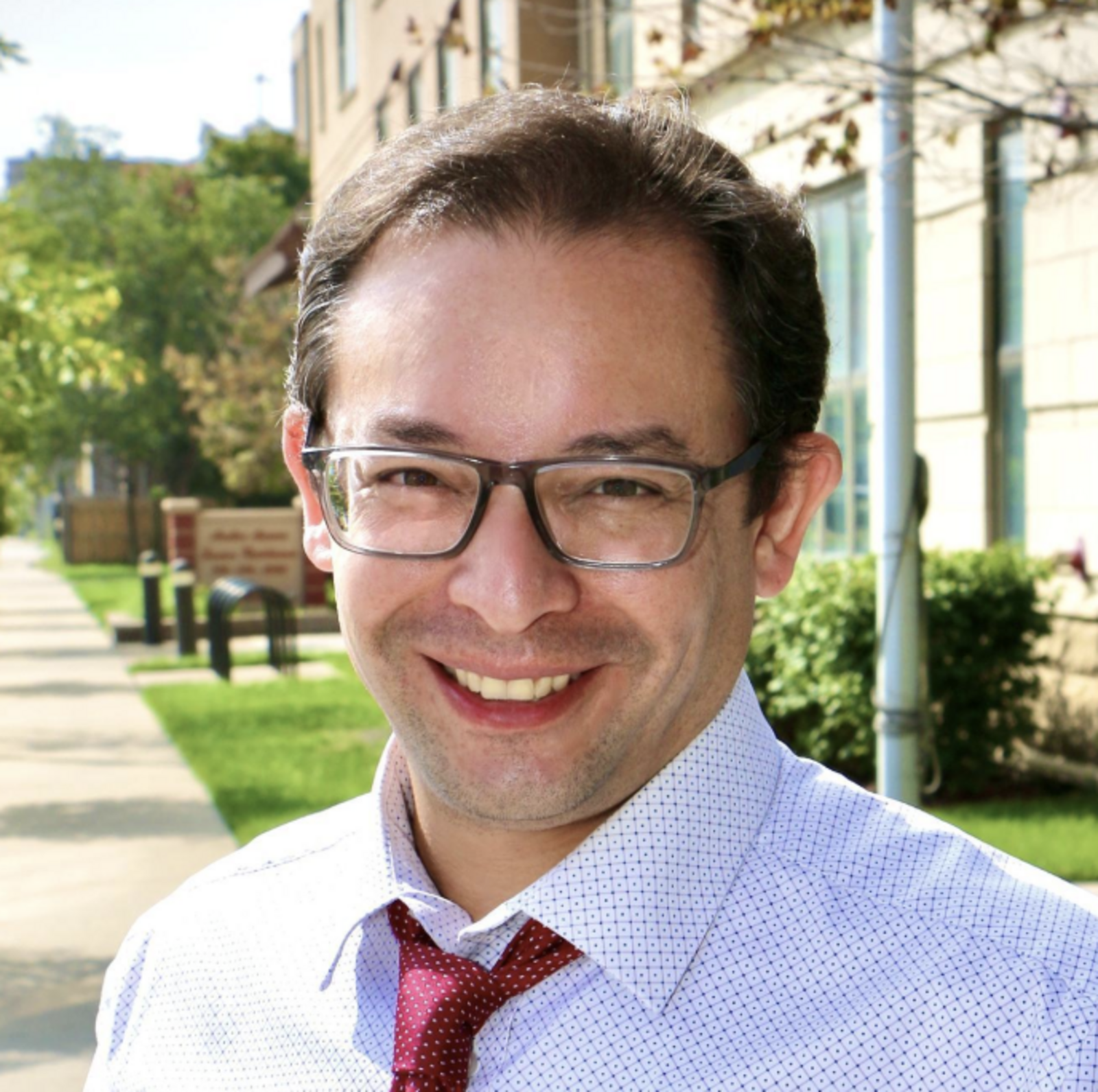 Headshot of Raymond