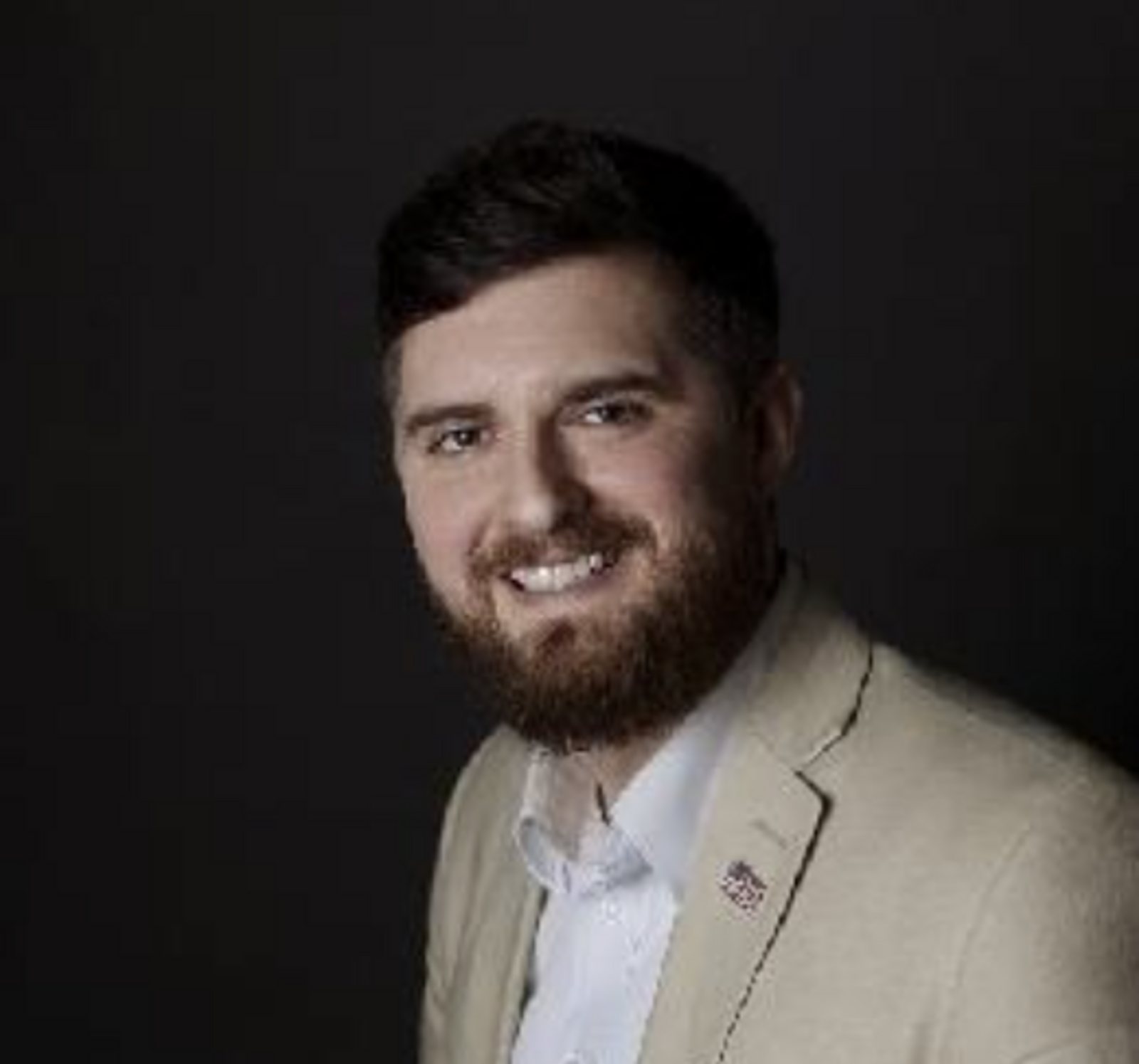 Headshot of Adam