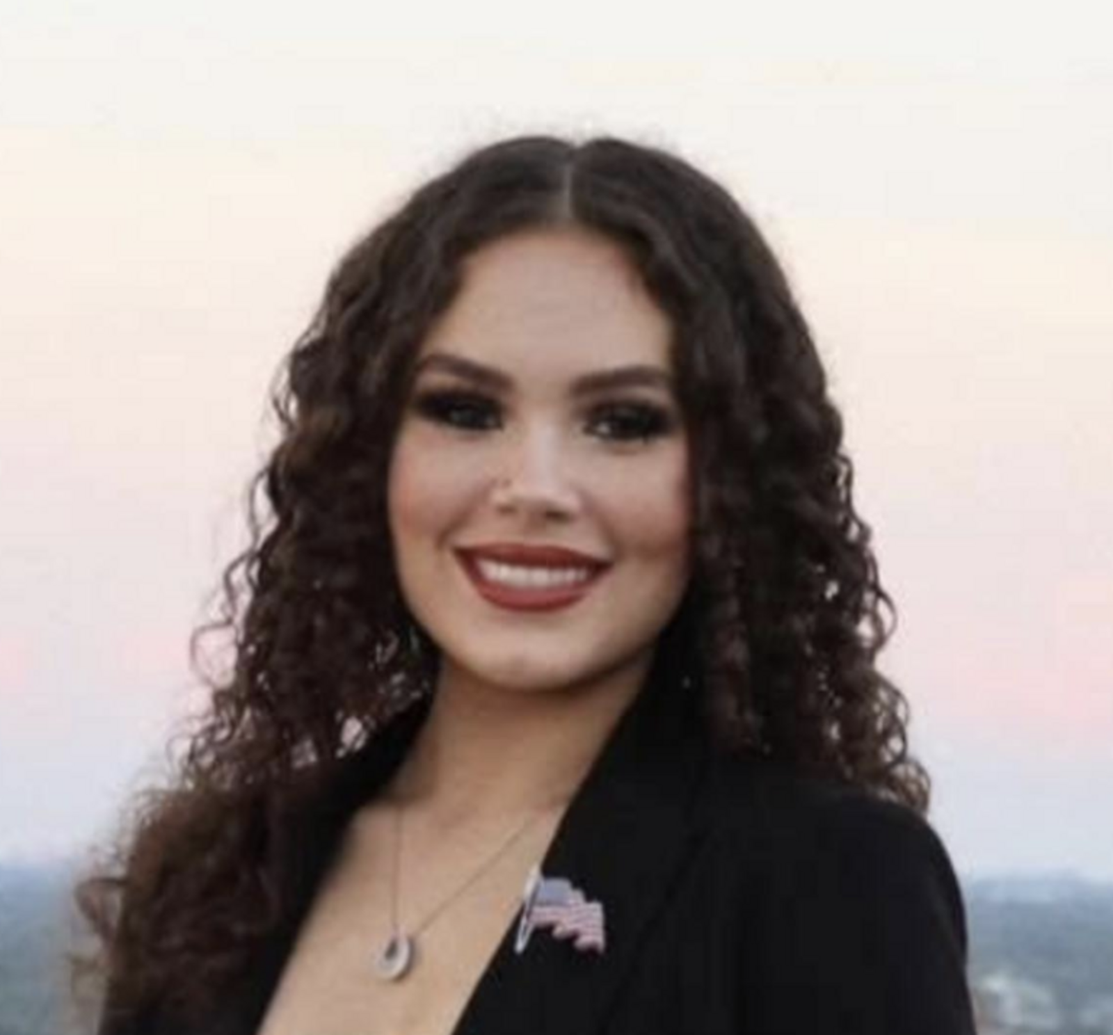 Headshot of Kelly