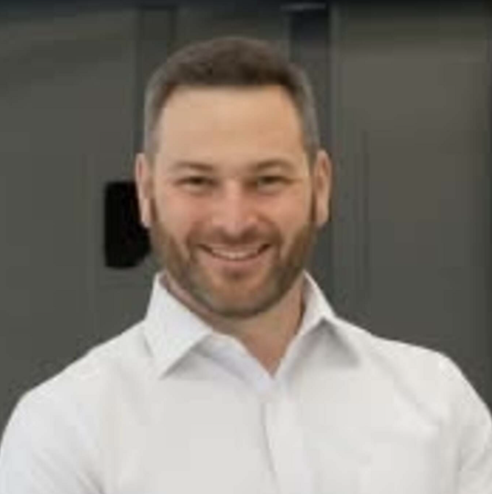 Headshot of Adam